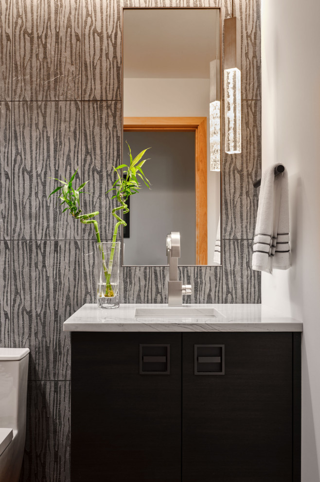 Inspiration for a mid-sized contemporary powder room in Denver with flat-panel cabinets, black cabinets, white walls, quartzite benchtops, white benchtops and a built-in vanity.