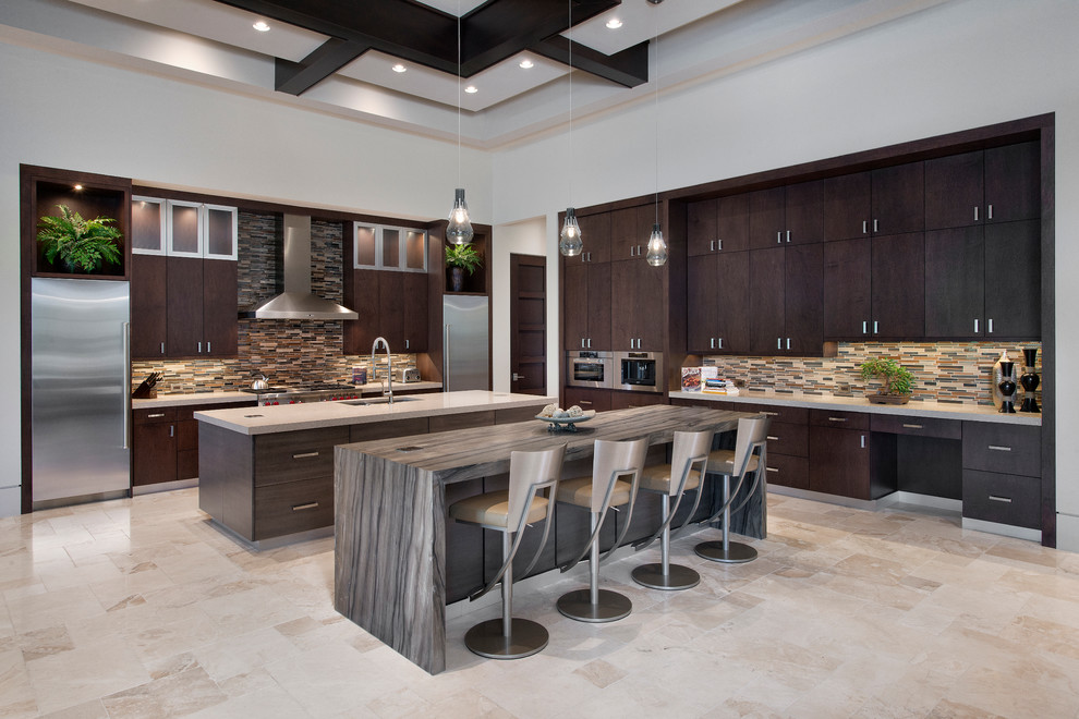 Large contemporary kitchen in Miami with flat-panel cabinets, dark wood cabinets, granite benchtops, multi-coloured splashback, stainless steel appliances, multiple islands, an undermount sink and mosaic tile splashback.