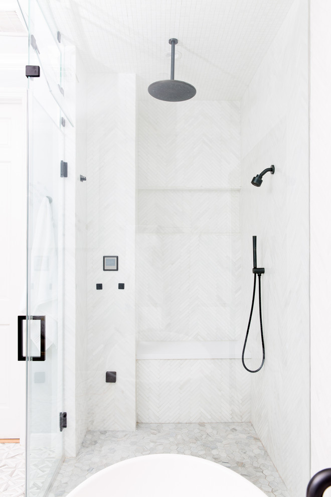 Photo of a mid-sized contemporary master wet room bathroom in Houston with shaker cabinets, white cabinets, a freestanding tub, a one-piece toilet, white tile, mosaic tile, beige walls, mosaic tile floors, an undermount sink, engineered quartz benchtops, a hinged shower door and white benchtops.