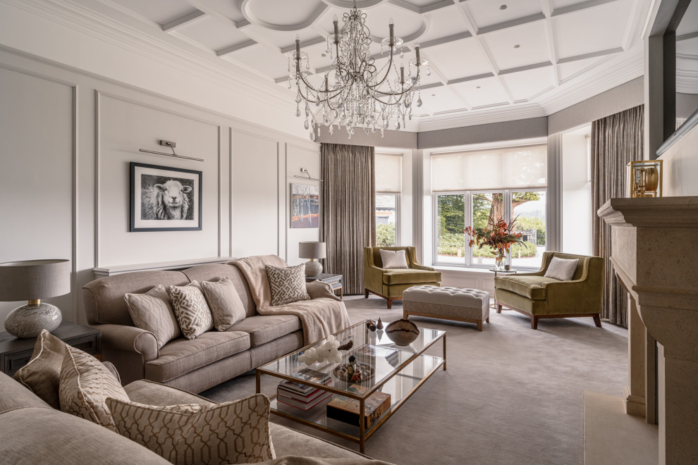 Photo of a traditional living room with grey walls, carpet, a standard fireplace, a stone fireplace surround, a wall mounted tv, grey floors, a coffered ceiling and wainscoting.
