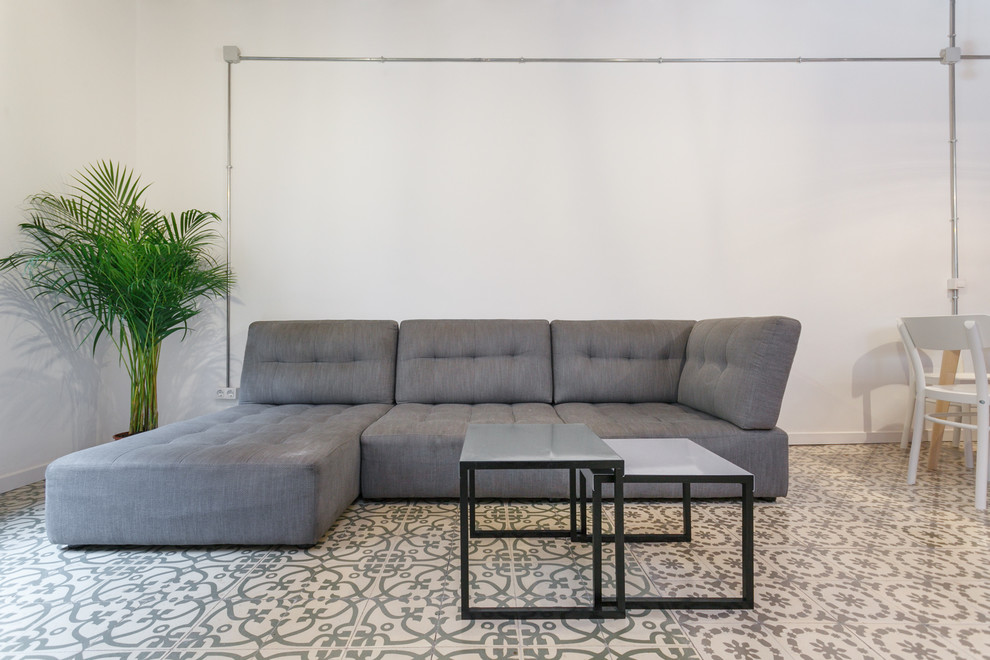 Imagen de sala de estar industrial pequeña