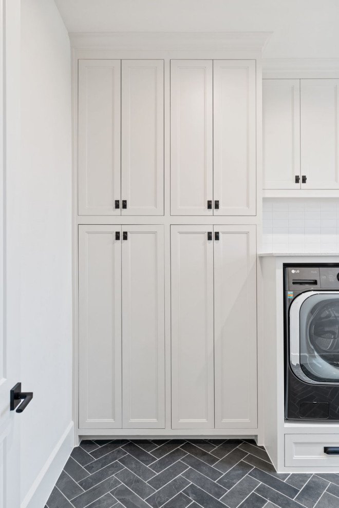 Laundry room - transitional laundry room idea in Dallas