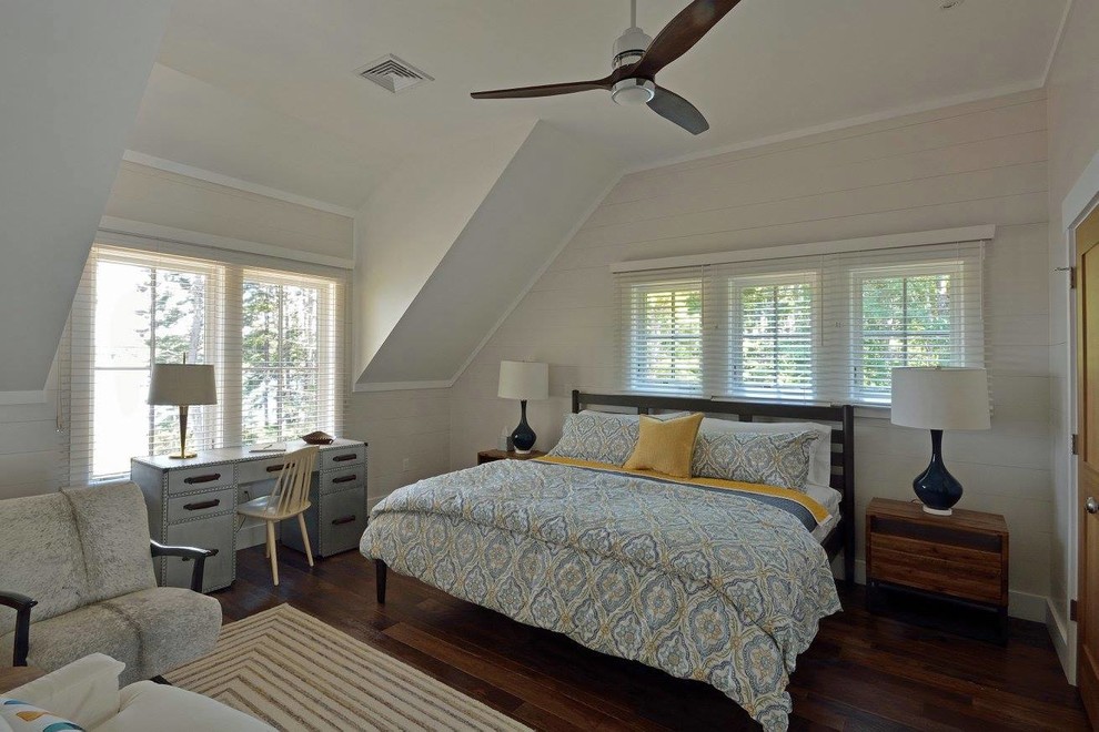 Traditional master bedroom in Portland Maine with white walls, dark hardwood floors and no fireplace.