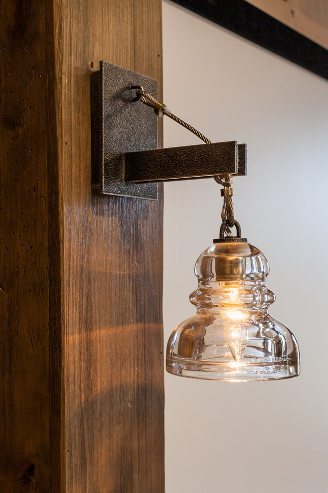 Inspiration for a large rustic open concept carpeted home design remodel with beige walls and a projector screen