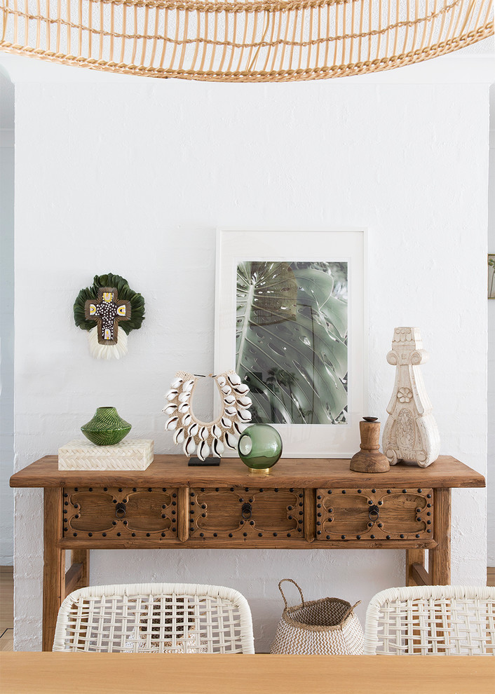 Beach style dining room in Brisbane.