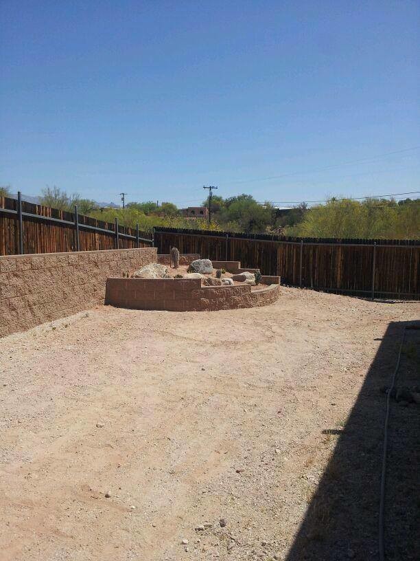 Inspiration for a rustic landscaping in Phoenix.