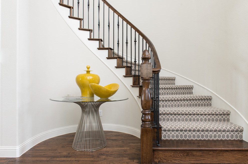 This is an example of a mid-sized transitional staircase in Dallas.