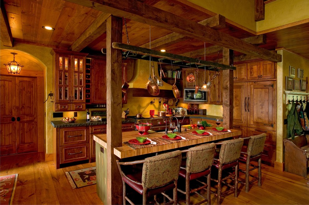 Inspiration for a country kitchen in Minneapolis with wood benchtops.