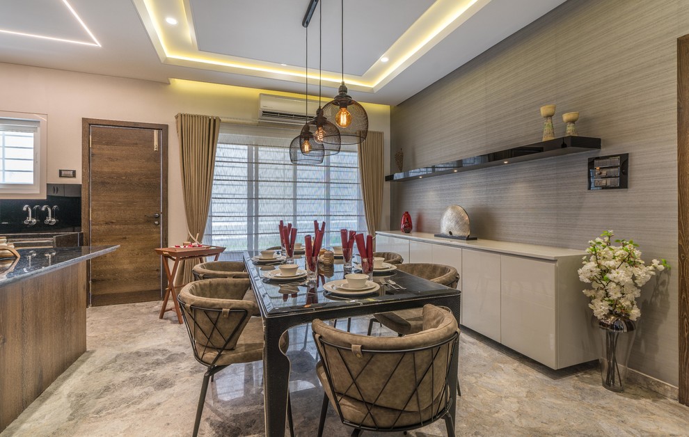 Inspiration for a contemporary dining room in Hyderabad.