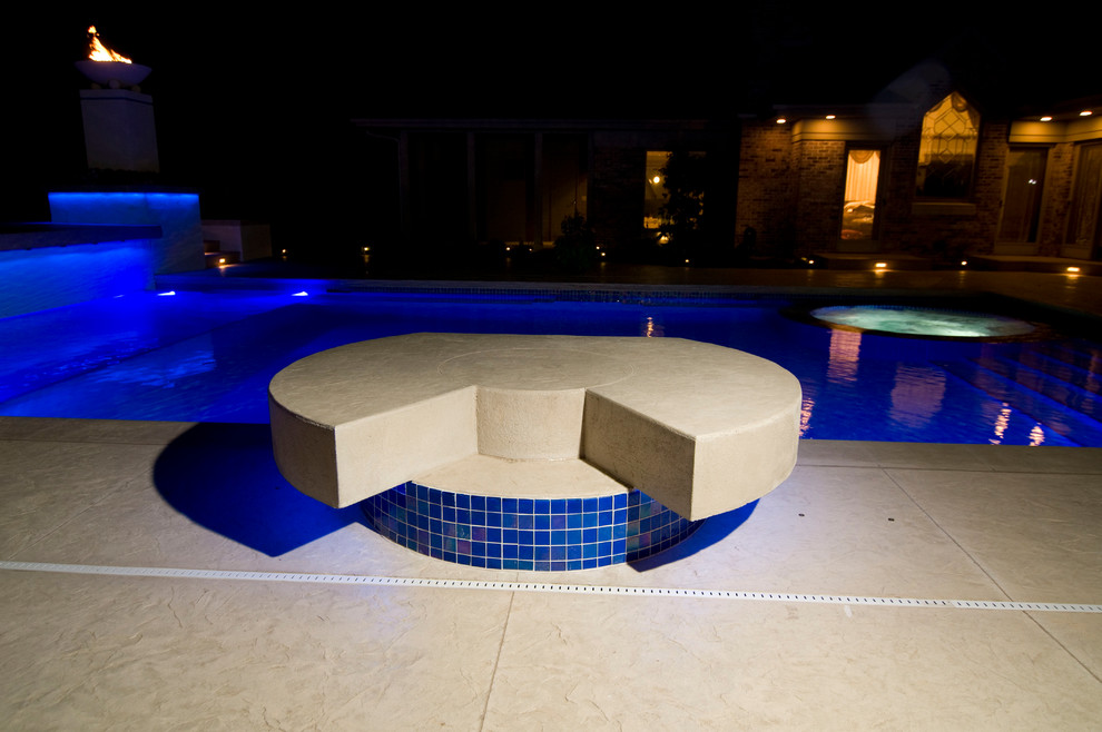 Hot tub - large transitional backyard concrete paver and rectangular natural hot tub idea in Cedar Rapids