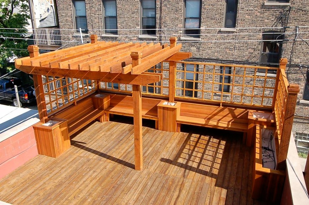 Deck - large transitional rooftop deck idea in Chicago with decking and a pergola