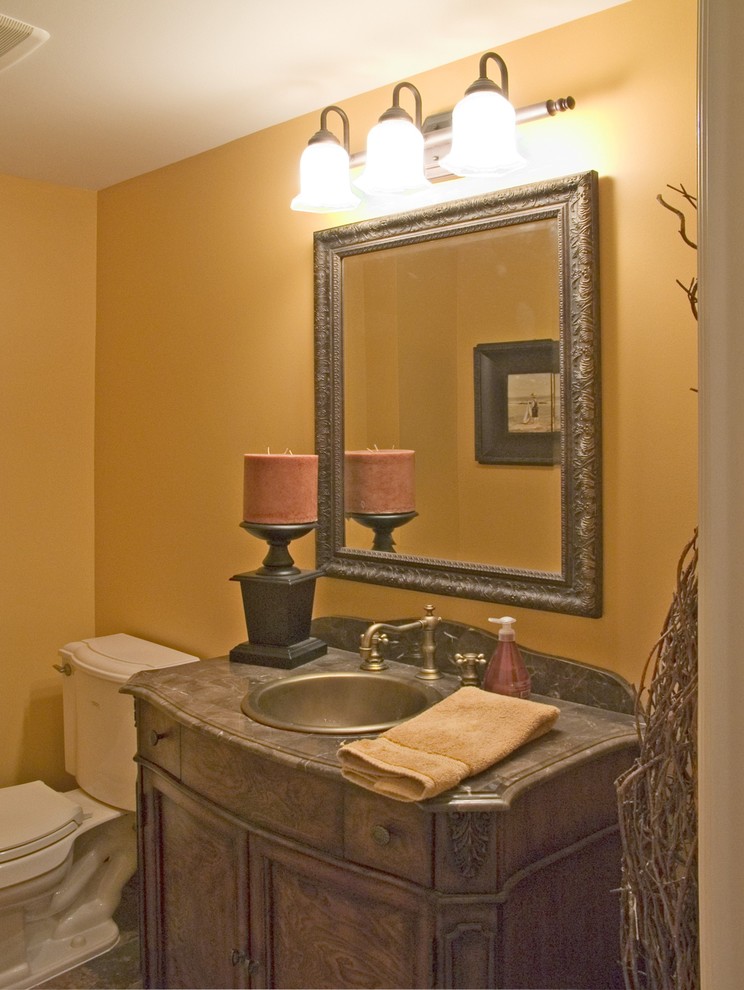 This is an example of a traditional powder room in Minneapolis.