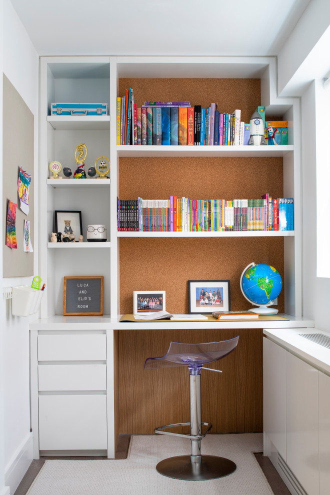 Design ideas for a mid-sized contemporary gender-neutral kids' bedroom for kids 4-10 years old in New York with blue walls, carpet, beige floor and wallpaper.
