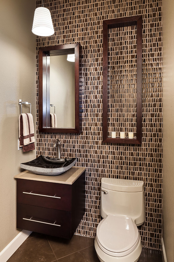 Photo of a traditional powder room in Portland with mosaic tile and a vessel sink.