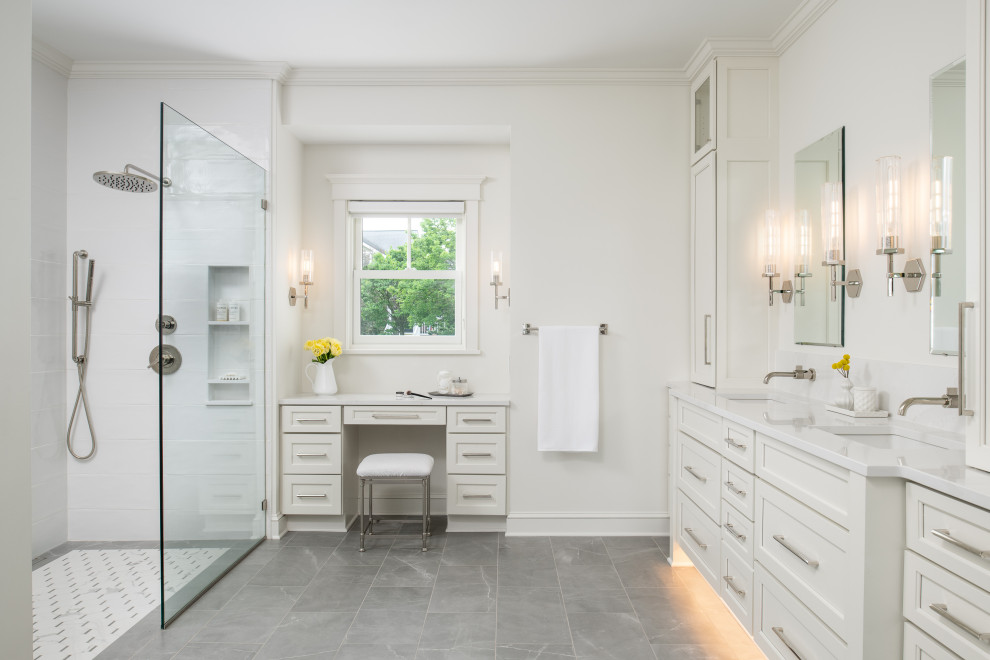 Inspiration for a large transitional master white tile and ceramic tile porcelain tile, gray floor and double-sink bathroom remodel in Burlington with shaker cabinets, white cabinets, white walls, an undermount sink, quartzite countertops, white countertops and a built-in vanity