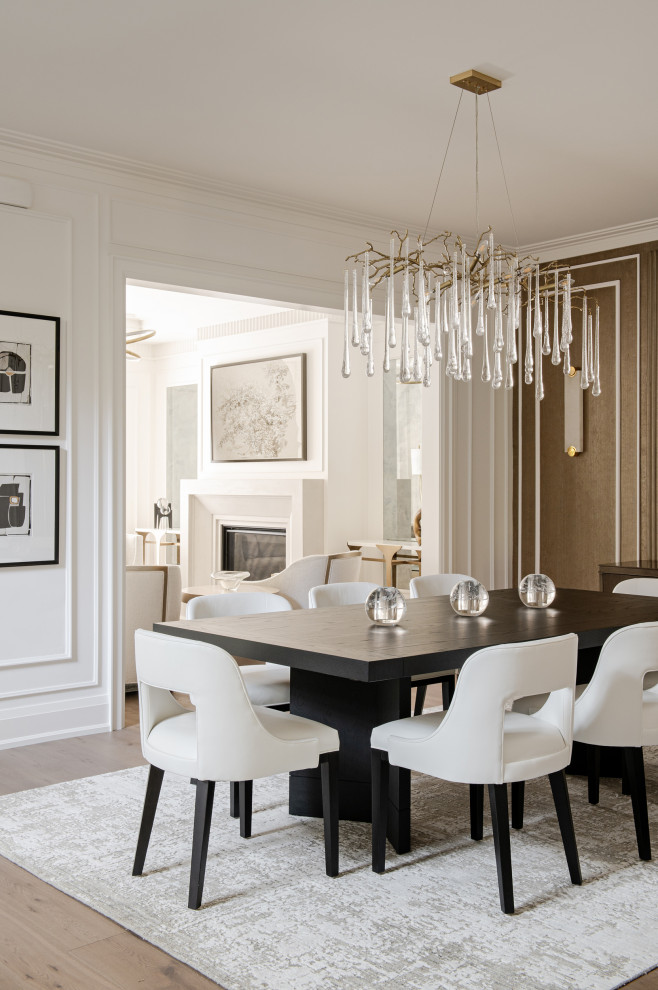 Large transitional light wood floor and wall paneling great room photo in Toronto with brown walls