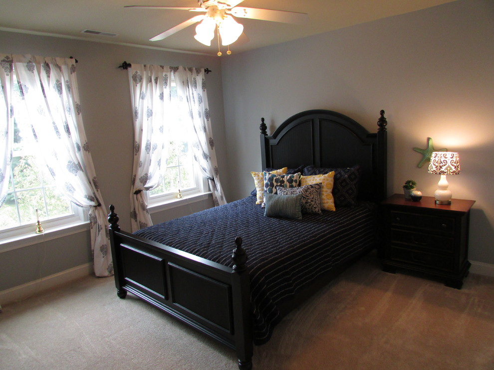 Photo of a mid-sized beach style guest bedroom in Baltimore with blue walls and carpet.