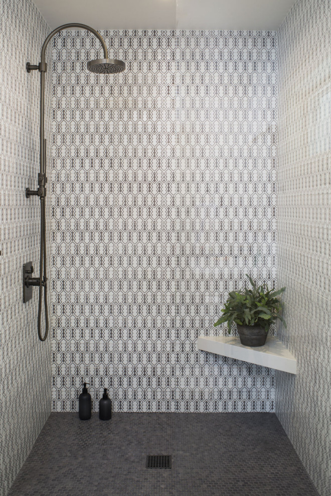 Inspiration for a mediterranean bathroom in Los Angeles with multi-coloured tiles and ceramic tiles.