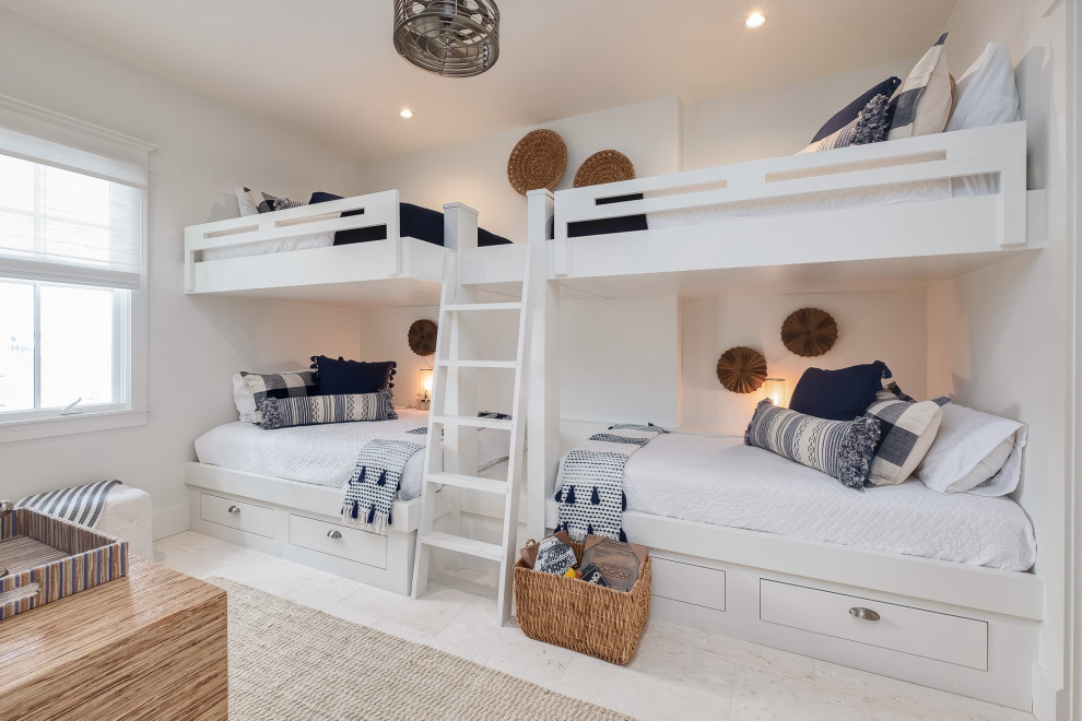 Photo of a beach style bedroom.
