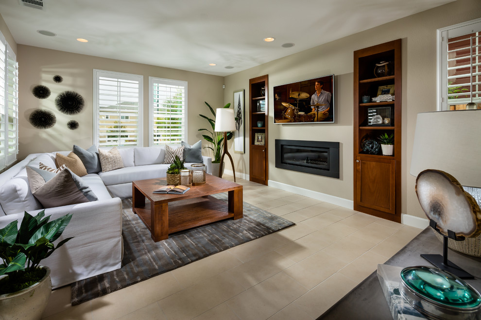 Beach style open concept living room in San Francisco with a wall-mounted tv.