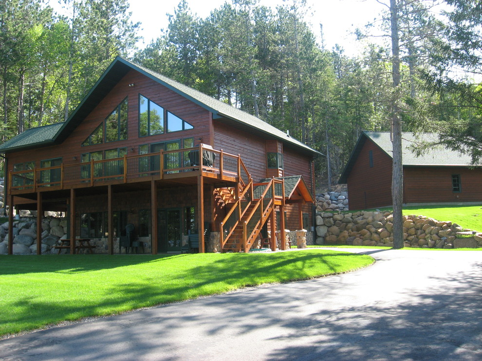Inspiration for a large rustic brown two-story wood exterior home remodel