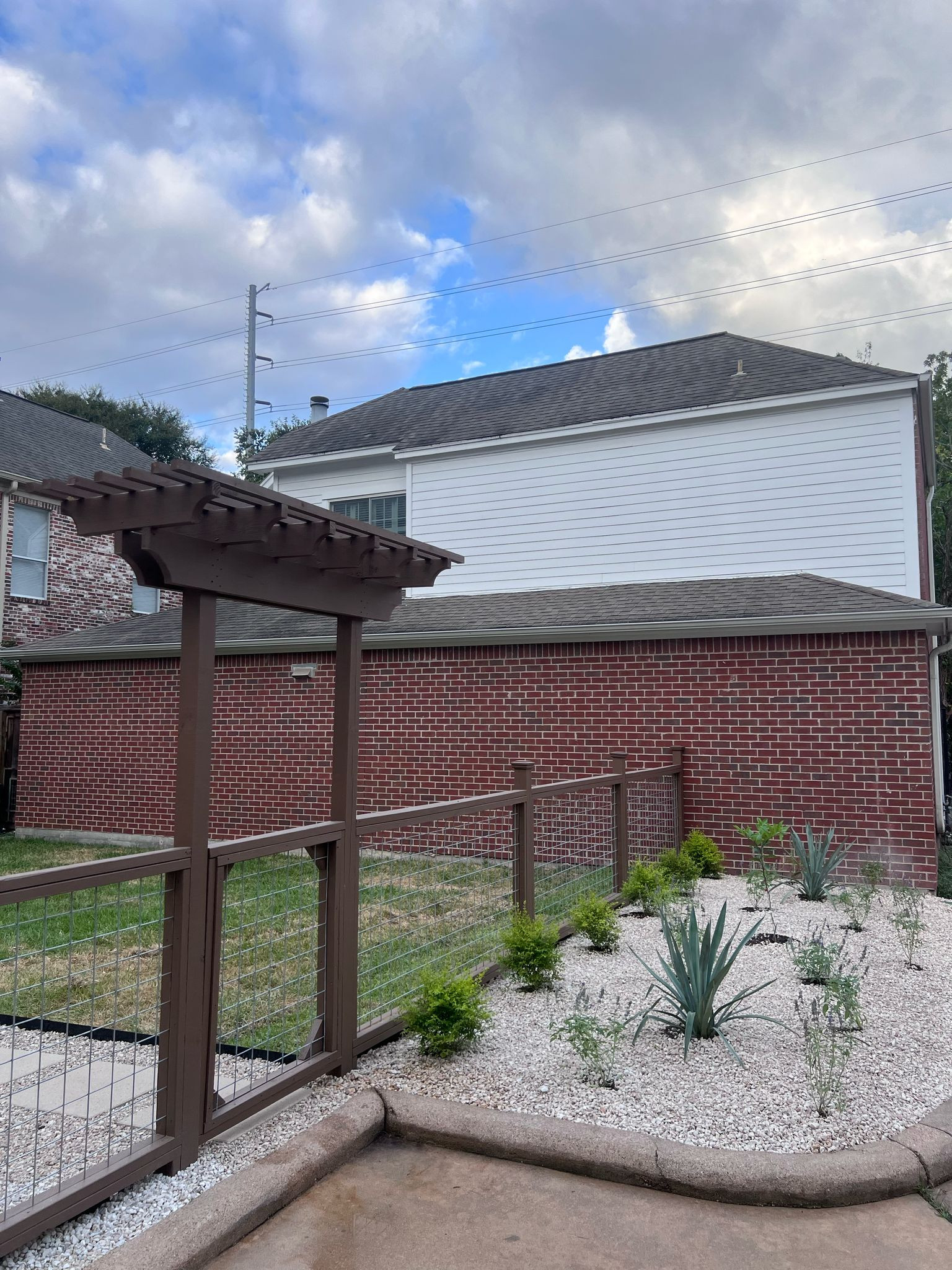 Beautiful stamped concrete patio with Pergola Cover on Haddon st!