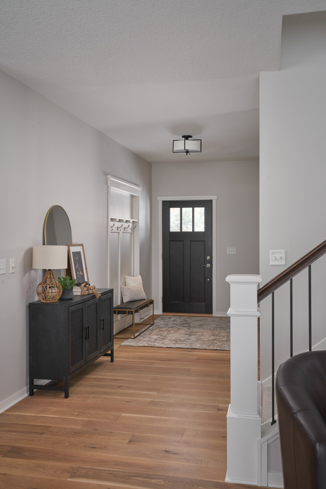 Inspiration for a transitional entryway remodel in Minneapolis