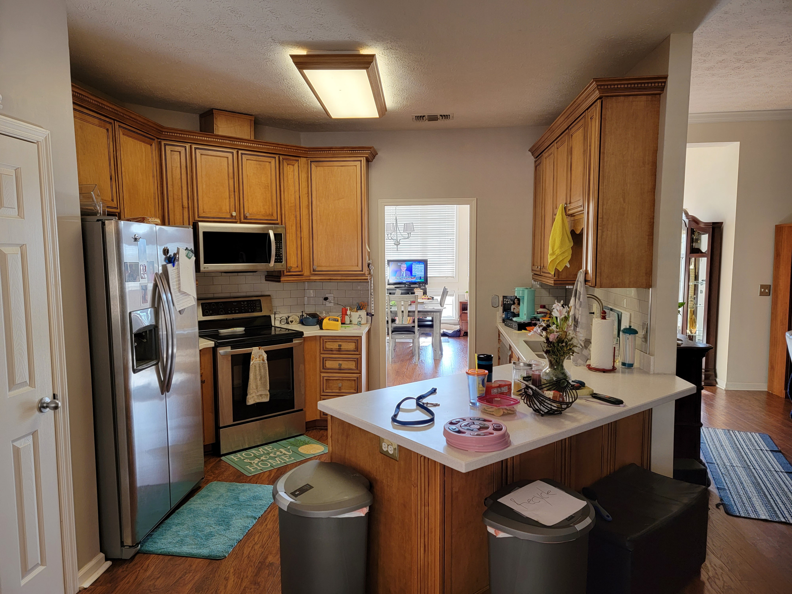 Wall removal and kitchen remodel with window seat