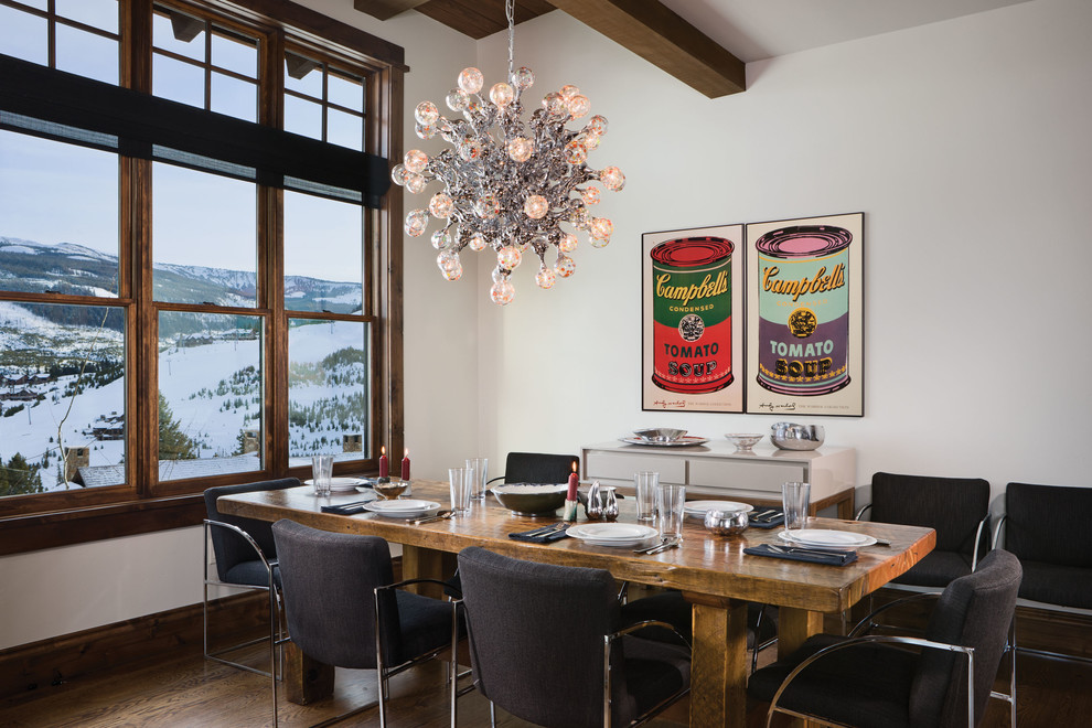 Dining room - rustic dark wood floor dining room idea with white walls