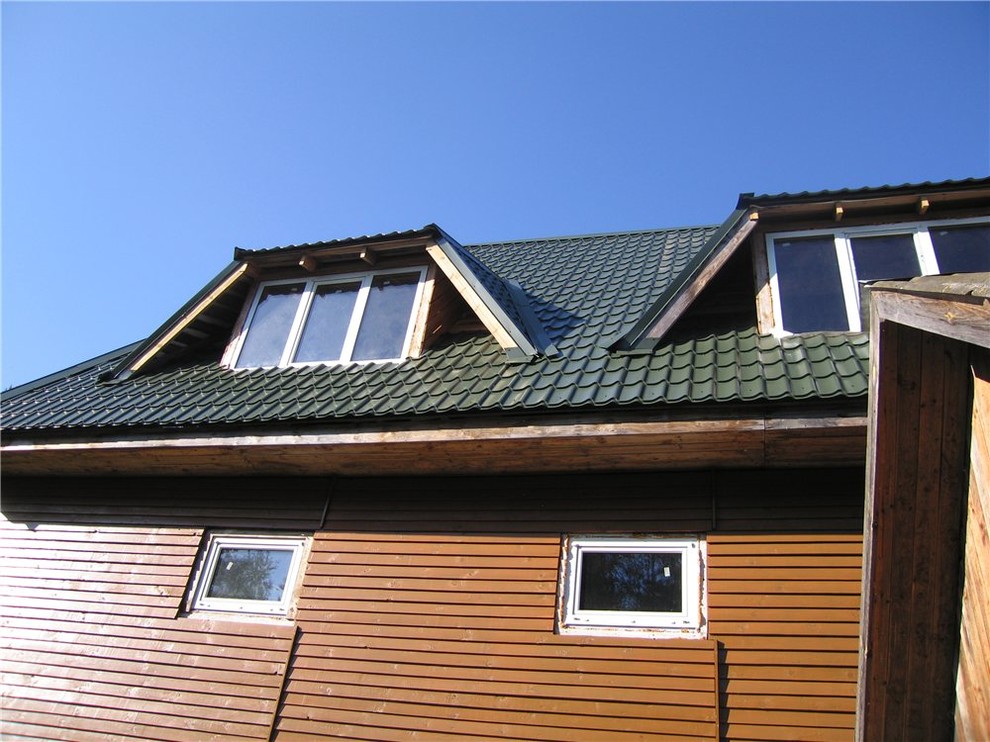 Замена фальцевой кровли на металлочерепицу на дачном доме