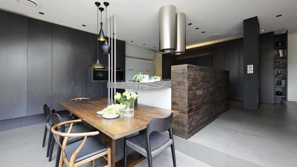Inspiration for a large contemporary l-shaped eat-in kitchen in Sydney with an undermount sink, flat-panel cabinets, white cabinets, marble benchtops, stainless steel appliances, ceramic floors and with island.