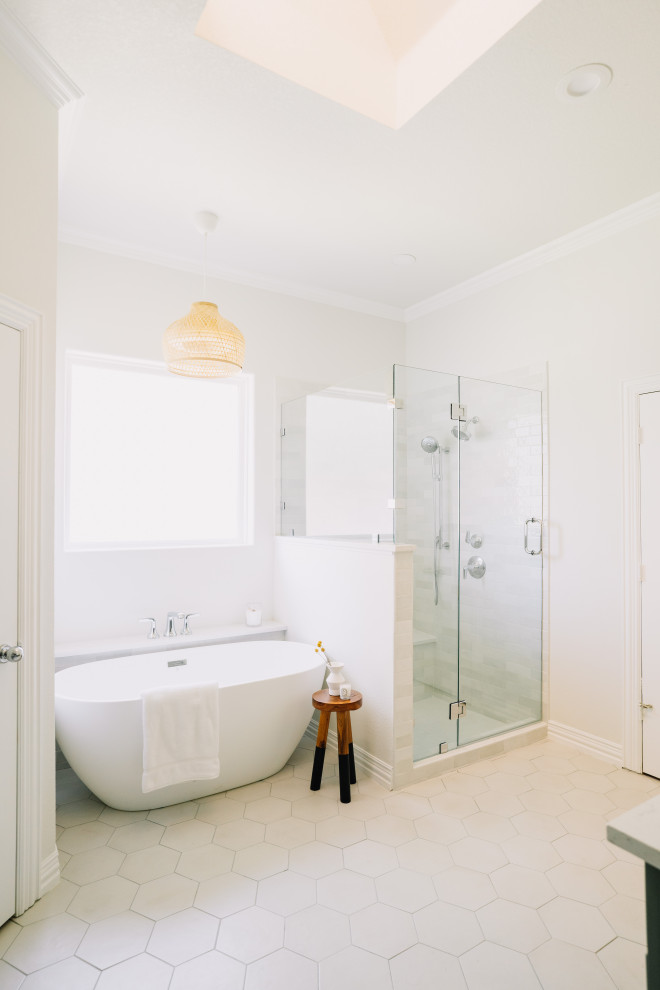 Inspiration for a medium sized contemporary ensuite bathroom in Dallas with green cabinets, a freestanding bath, an alcove shower, white tiles, white walls, ceramic flooring, white floors, double sinks and a built in vanity unit.