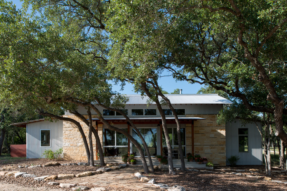 Inspiration for a contemporary exterior in Austin with metal siding.