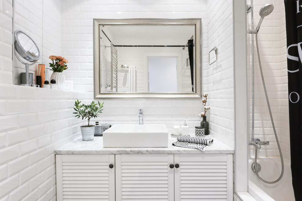 Inspiration for a contemporary master bathroom in Moscow with louvered cabinets, white cabinets, an alcove tub, a shower/bathtub combo, white tile, subway tile, a vessel sink, marble benchtops and a shower curtain.