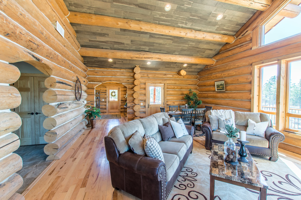 Example of a mountain style home design design in Denver