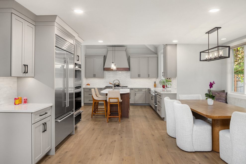 Example of a transitional kitchen design in Seattle