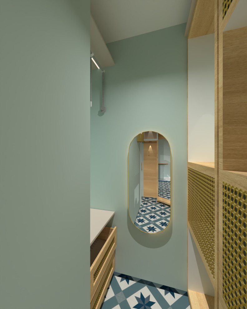 Small contemporary gender-neutral walk-in wardrobe in Lyon with light wood cabinets, vinyl floors and turquoise floor.