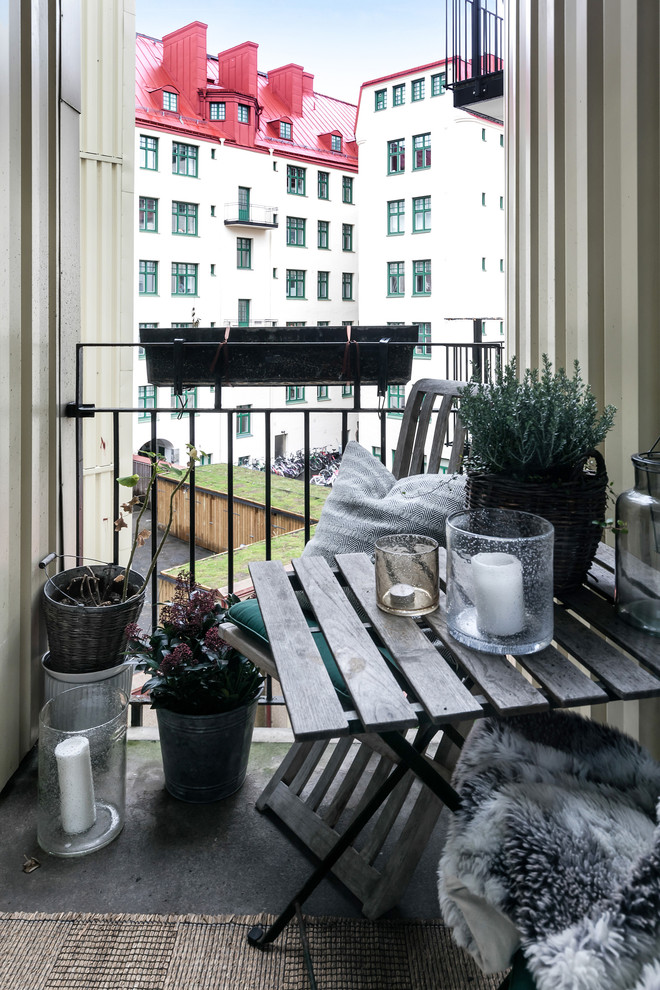 Design ideas for a small scandinavian balcony in Gothenburg.