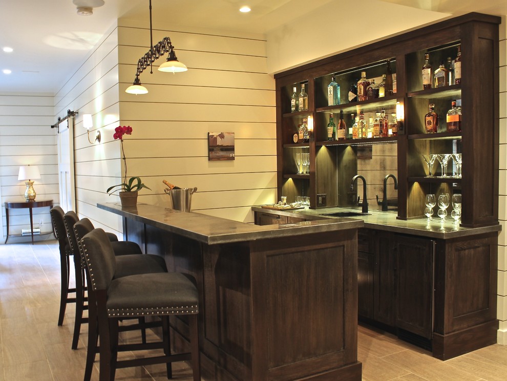 Photo of a transitional home bar in New York.