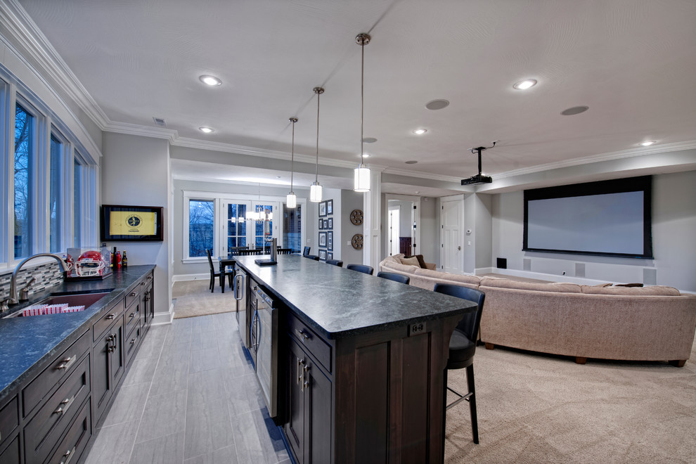 Example of a large transitional single-wall porcelain tile and beige floor kitchen design with an undermount sink, beaded inset cabinets, dark wood cabinets, laminate countertops, multicolored backsplash and matchstick tile backsplash
