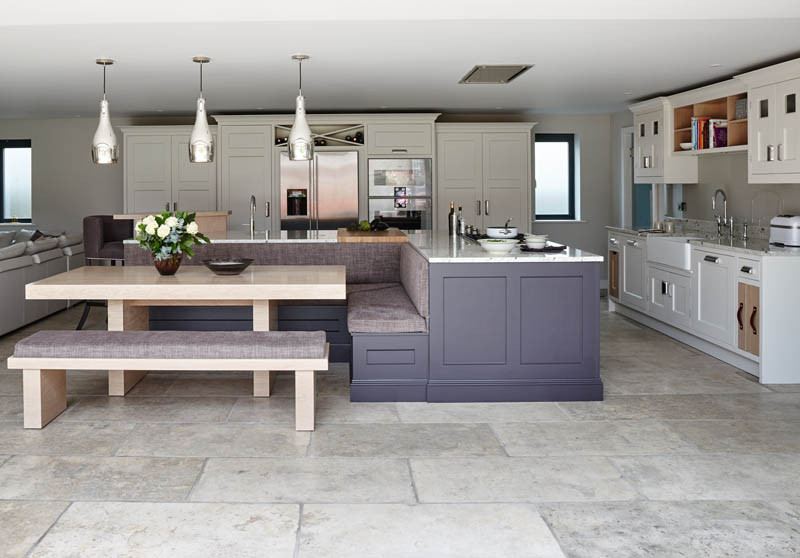 Design ideas for a large country l-shaped eat-in kitchen in London.