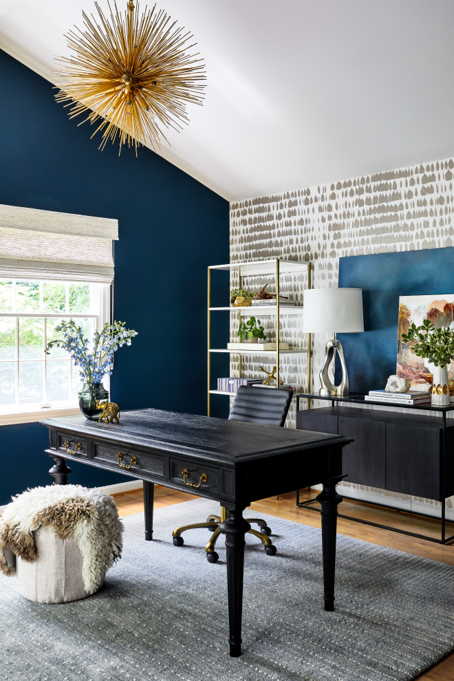 Inspiration for a transitional study room in Baltimore with blue walls, a freestanding desk and wallpaper.