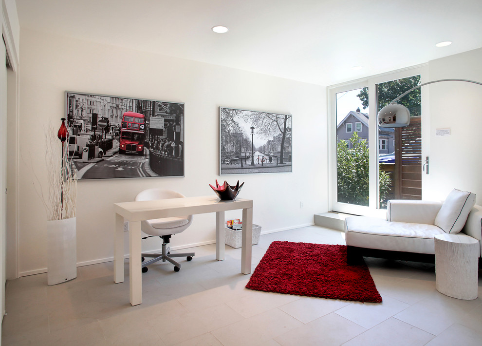 Design ideas for a contemporary home office in Portland with white walls.