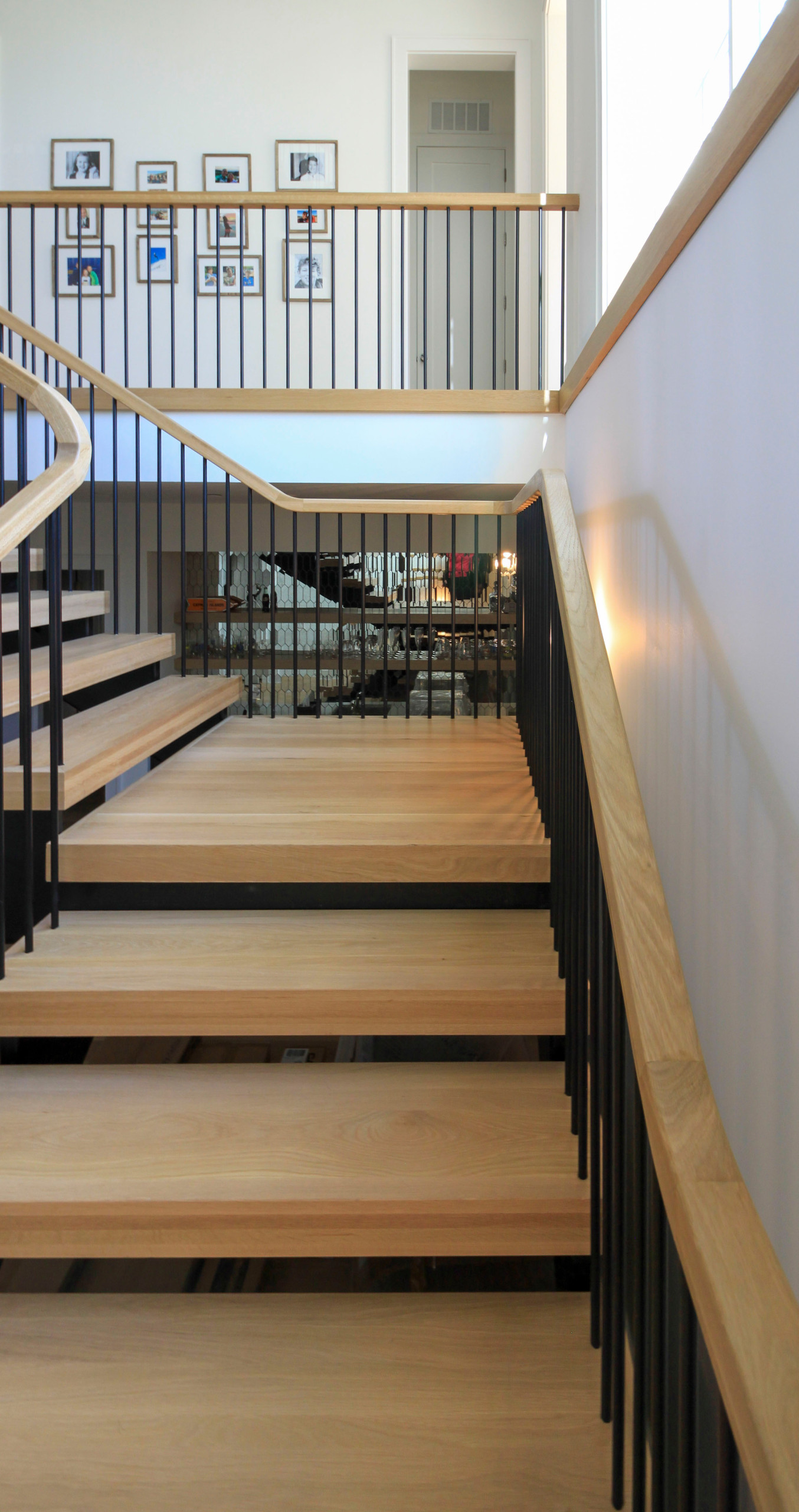 96_Dramatic cantilevered no-riser staircase, Bethesda, MD 20814