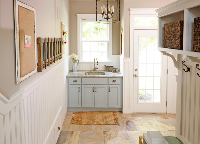 Inspiration for a transitional ceramic tile single front door remodel in Charlotte with gray walls and a glass front door