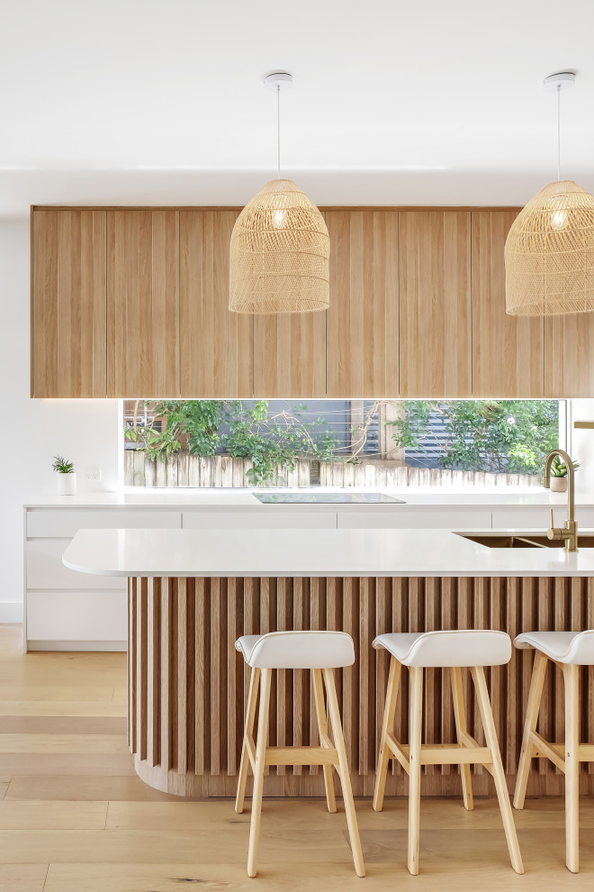 This is an example of a beach style home bar in Sydney.