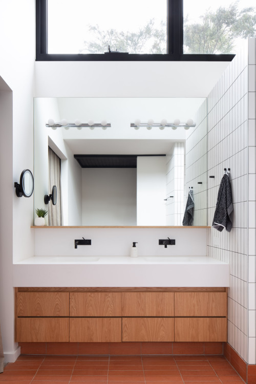 Spacious Comfort: Brown Floor Tiles and Wood Cabinets in Contemporary Bathrooms