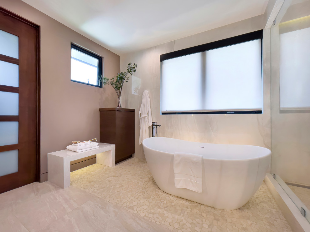 Design ideas for a large contemporary master bathroom in Los Angeles with flat-panel cabinets, dark wood cabinets, a freestanding tub, a corner shower, a one-piece toilet, white tile, porcelain tile, purple walls, an undermount sink, engineered quartz benchtops, a hinged shower door, white benchtops, a double vanity, a floating vanity, mosaic tile floors and beige floor.