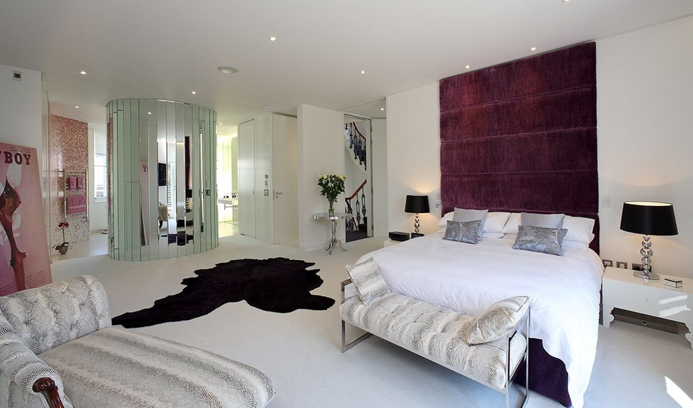 Design ideas for a large contemporary master bedroom in London with white walls, carpet and white floor.