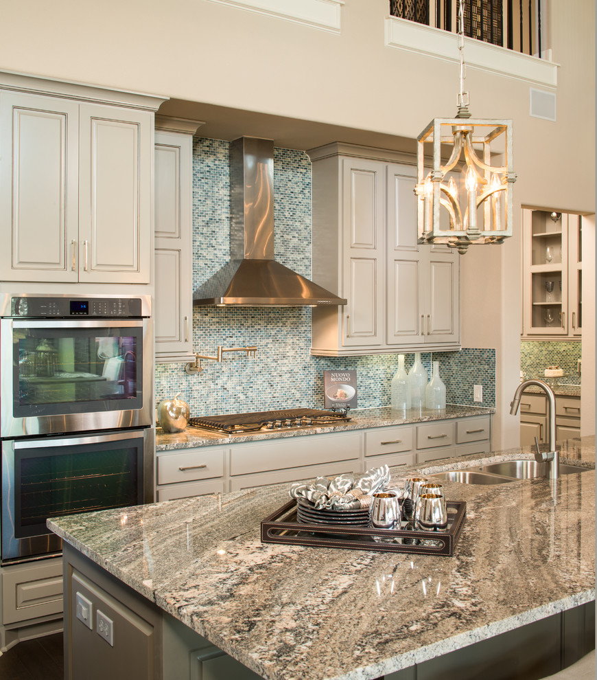 This is an example of a transitional kitchen in Austin.